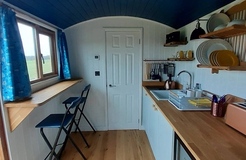 Polegate Cabin | Luxury shepherd's hut with sunset veiws