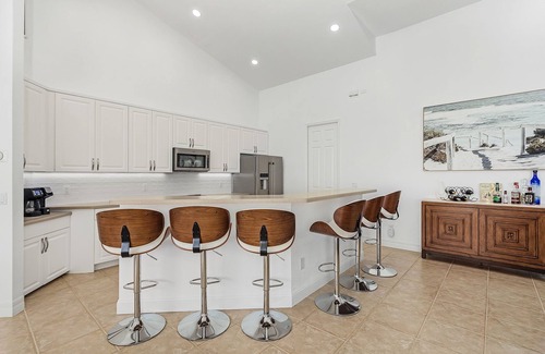 Cape Coral House | Luxury Tropical Oasis on the Caloosahatchee River with Panoramic Southern Views!