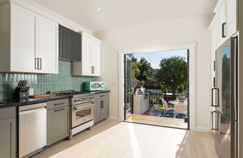Oak Park House | Magical Downtown Oasis with Hot Tub, Deck, AC ~ Pet Friendly! Huge Private Yard!