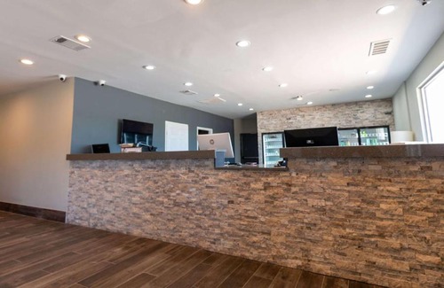 Irving Cabin | Magnuson Extended Stay and Suites Airport Hotel