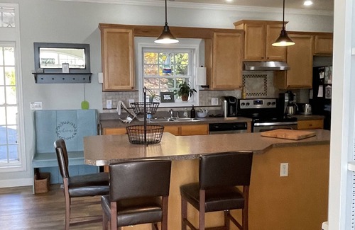 Wildwood Point House | Main Lakefront Family Home, Beach, Kayaks/SUPs, Boat Slip, Dog Friendly