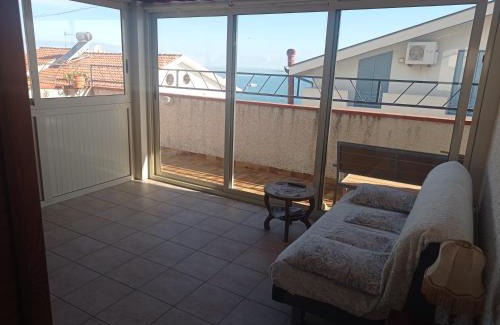 Oliveri House | Mansarda con terrazzo vista mare