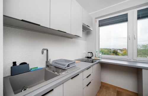 Baluty Apartment | Manufaktura Comfort Stay Apartment by BookingHost