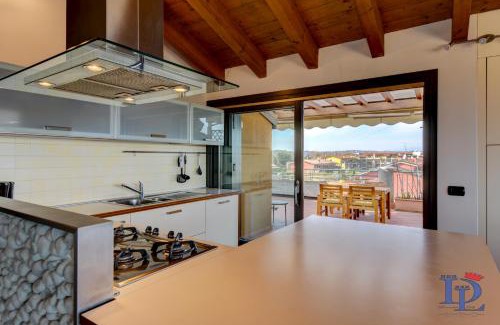 Rivoltella Apartment | Marriott Paradise Lake View in a 5 pools exclusive residence DesenzanoLoft Official Partner Homes & Villas by Marriott Bonvoy