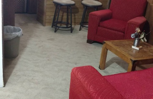 Minneapolis House | Master suite in basement of single family home.