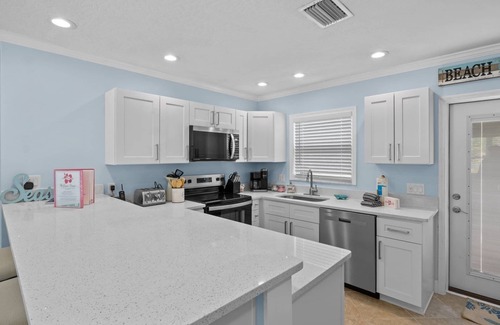 Anna Maria House | McBean Point: Dog Friendly! Walk to Bean Point! by Anna Maria Life Vacation Rentals