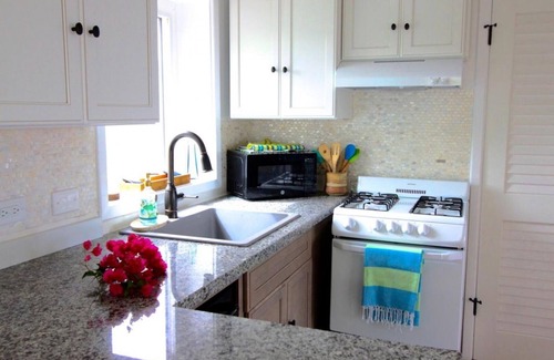 Lower Carolina House | Mesmerizing view with pool 2 bedroom stone cottage in Coral Bay