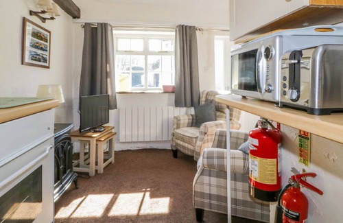 Braithwaite Cottage | MEWS STUDIO COTTAGE 6, pet friendly, with a garden in Braithwaite