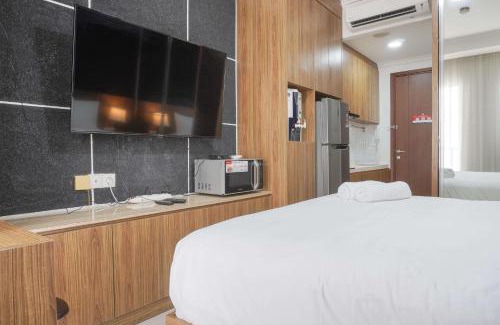 East Jakarta Apartment | Minimalist and Comfort Stay Studio Room at Signature Park Grande Apartment By Travelio