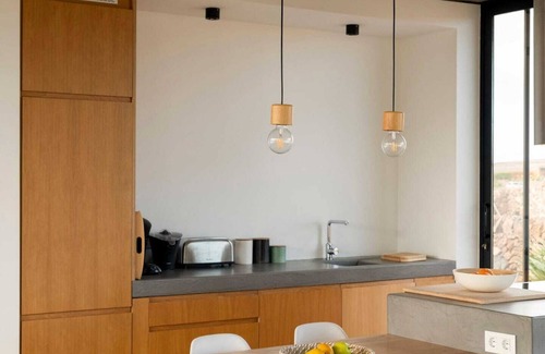 Lajares House | Minimalist house with heated pool and great volcano view