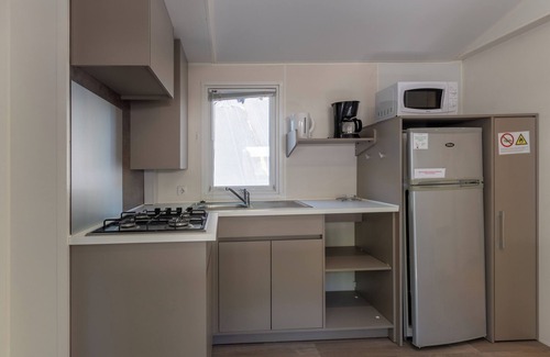 Lavilledieu RV Rental | Mobile Home 'Confort A - 1-8 Pers' with Shared Pool, Private Terrace and Shared Garden