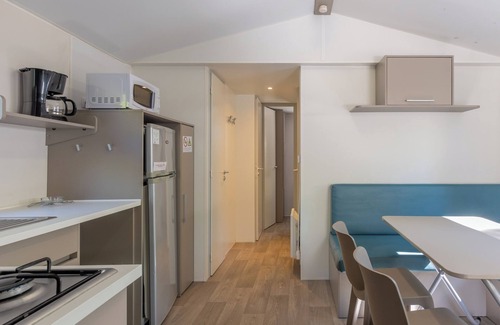 Lavilledieu RV Rental | Mobile Home 'Confort A - 1-8 Pers' with Shared Pool, Private Terrace and Shared Garden