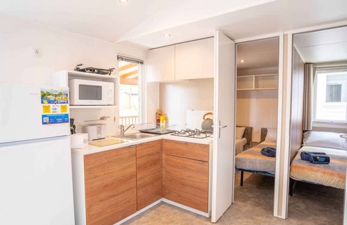 Gralaoni-Pralesi-Cisano House | Mobilehome with air conditioning, terrace and pool