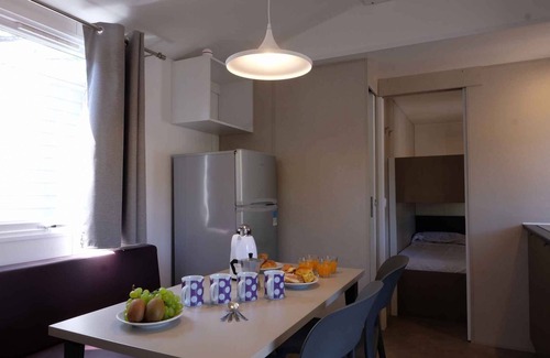 Mandrione House | Mobilehome with half-imagined wooden terrace