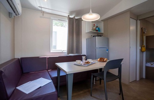 Mandrione House | Mobilehome with half-imagined wooden terrace