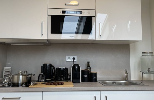 Nove Mesto Apartment | Modern 1-bedroom apartment in City Center with Table Football