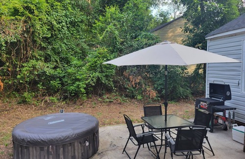 Fayetteville House | Modern 2 bedroom 1 bath home with barbeque grill and sauna pool.