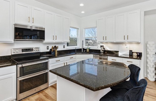 Aurora House | Modern 4 bedroom home with hot tub and office