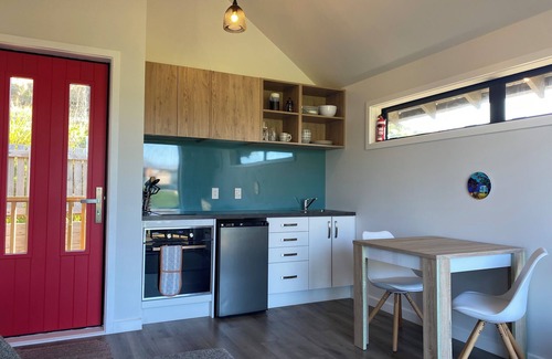 Castlepoint Apartment | Modern apartment with stunning views of Lighthouse and short walk to beach.