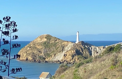 Castlepoint Apartment | Modern apartment with stunning views of Lighthouse and short walk to beach.
