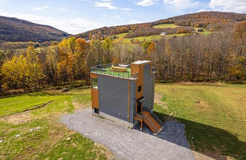 Stamford Villa | Modern Catskill House & Lake NY with hot tube on the roof