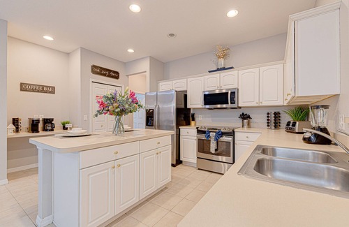 Watersong Villa | Modern clean home with private pool covered patio, game room and close to Disney