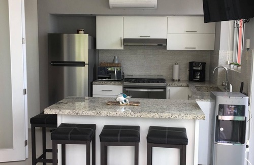 Amapas Condo | Modern Condo in Bella Loma, steps from the beach, with Ocean views!