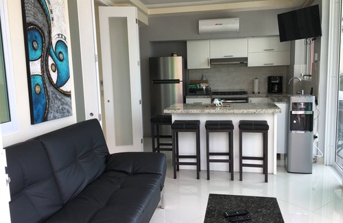 Amapas Condo | Modern Condo in Bella Loma, steps from the beach, with Ocean views!