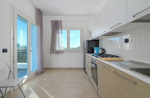 Golfo Aranci Apartment | Modern Holiday Apartment 7 in Villa Marconi with Sea & Mountain View & Private Sun Terrace