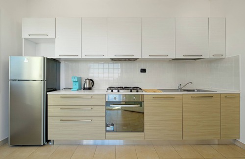 Golfo Aranci Apartment | Modern Holiday Apartment 7 in Villa Marconi with Sea & Mountain View & Private Sun Terrace