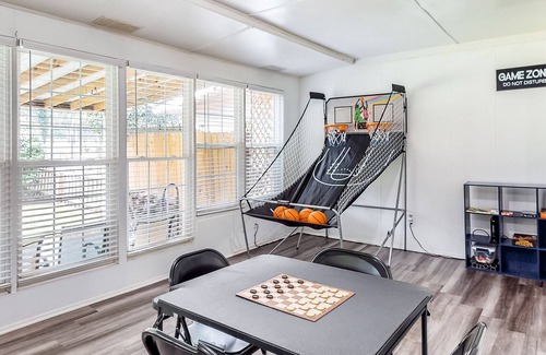 Gracewood House | Modern home with a game room, washer/dryer, AC, covered patio, & large yard