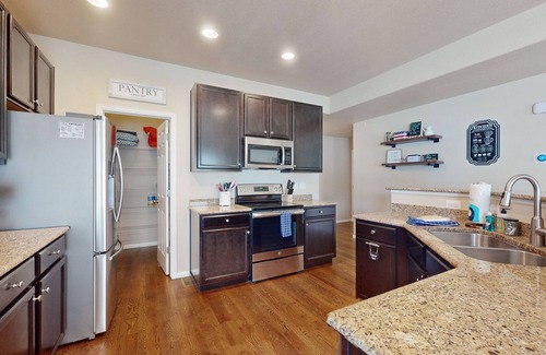 Fountain House | Modern home with fenced yard, firepit, foosball & WFH desks