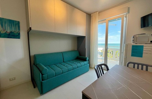 Porto Santa Margherita Apartment | Modern studio with shared pool