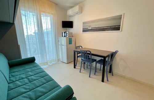 Porto Santa Margherita Apartment | Modern studio with shared pool