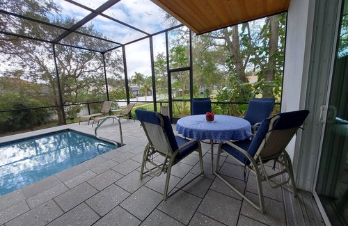 Palm Harbor House | Modern Jewel, 10 Min. drive to Honeymoon Island, Sleeps 4, Lap Pool, WorkoutRoom