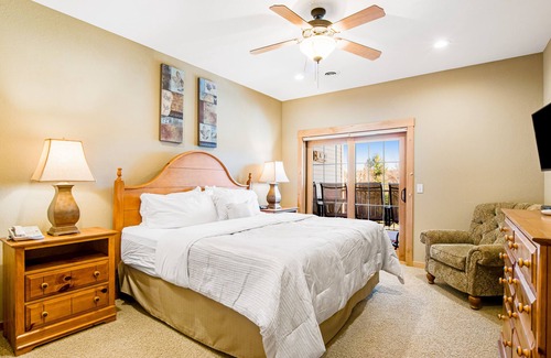 Three Lakes Condo | Modern, lake-view condo with loft, balcony, fireplace, pool & hot tub access