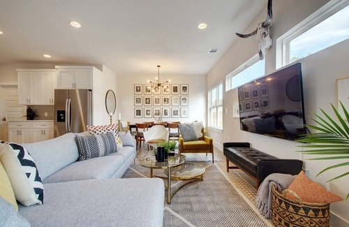 East MLK House | Modern Luxury Home | Shared Pool