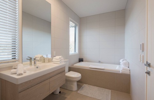 Lower Shotover House | Modern luxury with spa pool, outdoor fireplace, table tennis and darts
