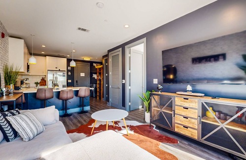 Rolling Mill Hill Condo | Modern Muse downtown condo with private balcony, central AC, & rooftop lounge