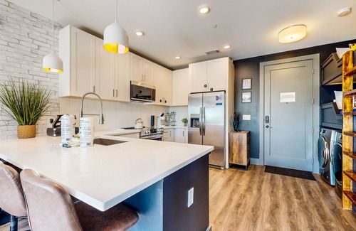 Rolling Mill Hill Condo | Modern Muse downtown condo with private balcony, central AC, & rooftop lounge