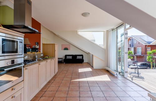 Municipality of Uitgeest Apartment | Modern penthouse with stunning lake views