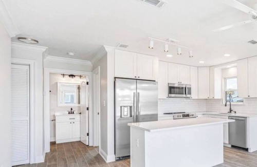 Sunnyside Villa | Modern Poolside villa: Steps to the sand, modern comforts, ultimate relaxation