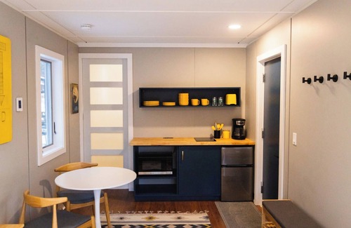 Johnson House | Modern Tiny House with hot tub & river near Stowe