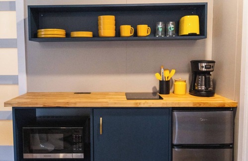 Johnson House | Modern Tiny House with hot tub & river near Stowe