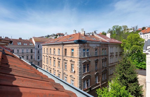 Smichov Apartment | Modern two-level apartment with balcony