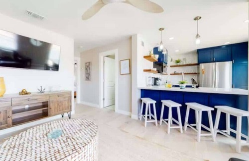 Port Isabel Apartment | Modern Waterfront Escape with a Deck & BBQ Grill