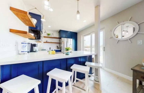 Port Isabel Apartment | Modern Waterfront Escape with a Deck & BBQ Grill