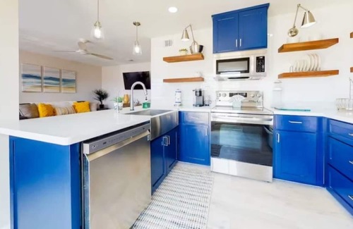 Port Isabel Apartment | Modern Waterfront Escape with a Deck & BBQ Grill