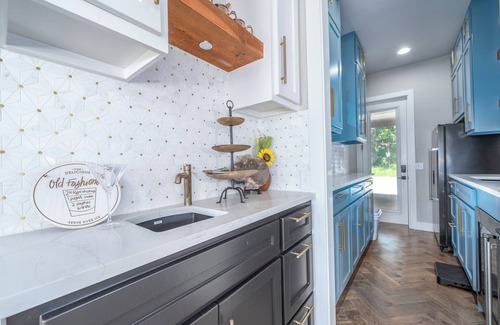 Afton House | Monkey Island Club & Court House [44X20 BOAT SLIP AND TWO JETSKI SLIPS]