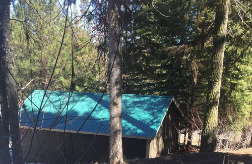 Cascade House | Mountain chalet nestled in the evergreens, peekaboo views of the lake in between